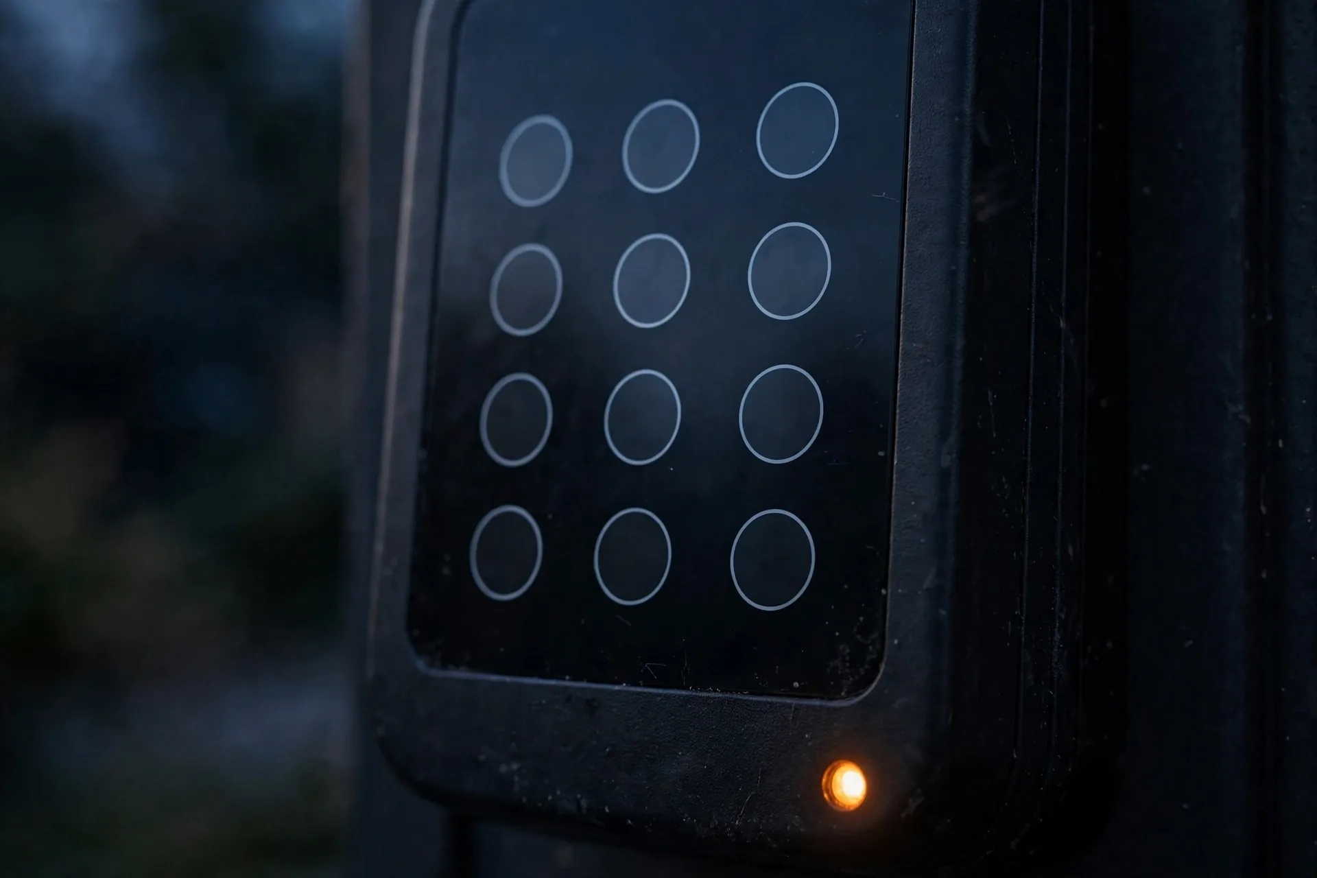 Yale smart lock keypad showing amber low battery gear warning icon